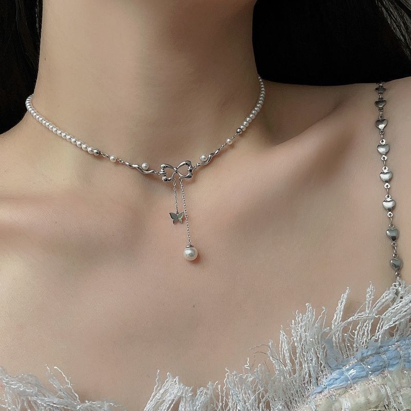 Butterfly Pearl Necklace Female Hollow Bow Tassel Clavicle Chain Niche High Sense Necklace