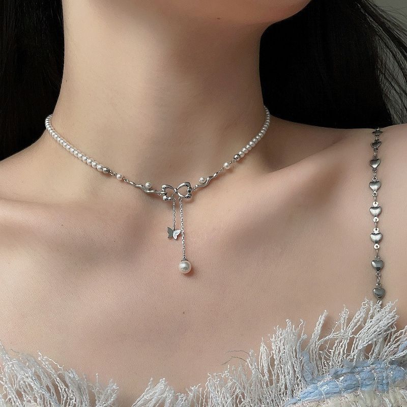 Butterfly Pearl Necklace Female Hollow Bow Tassel Clavicle Chain Niche High Sense Necklace