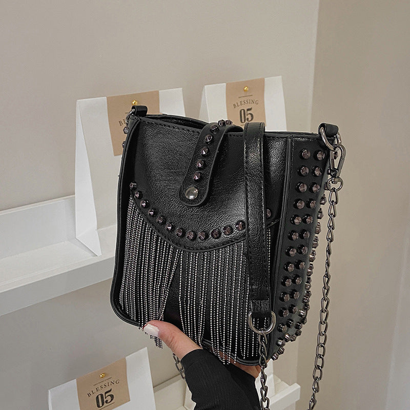 Cross-Border New Arrival Rivet Women's Bag European and American Locomotive Style Tassel Bag Ins Fashion Shoulder Messenger Bag Belt Bag Cell Phone Case