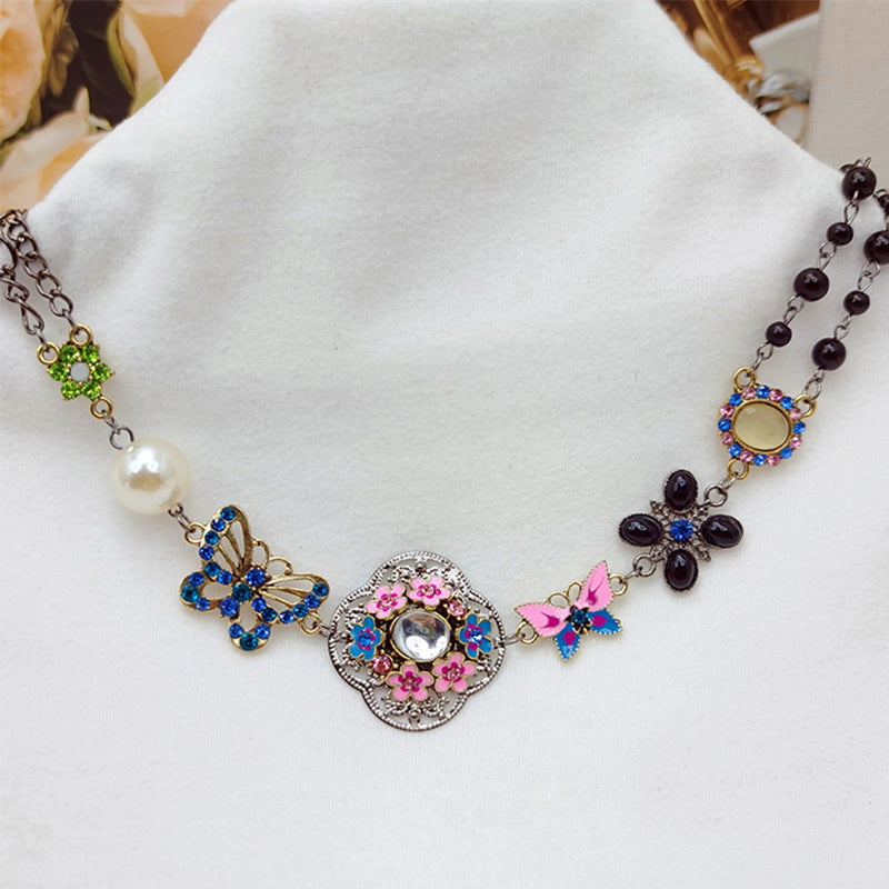 vakkv  HOTan and NEWn Retro Color Rhinestone Butterfly Hollow Flower Pearl Short Necklace Female Ethnic Style Necklace Wholesale