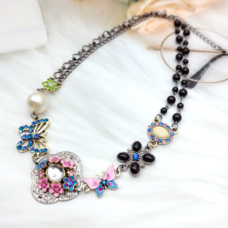 vakkv  HOTan and NEWn Retro Color Rhinestone Butterfly Hollow Flower Pearl Short Necklace Female Ethnic Style Necklace Wholesale