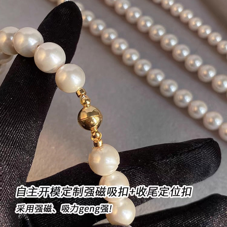 Shijiaao White Magnetic Buckle Perfect Circle Pearl Necklace for Women Autumn and Winter New Sweater Chain Light Luxury Temperament Necklace Wholesale