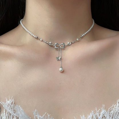 Butterfly Pearl Necklace Female Hollow Bow Tassel Clavicle Chain Niche High Sense Necklace